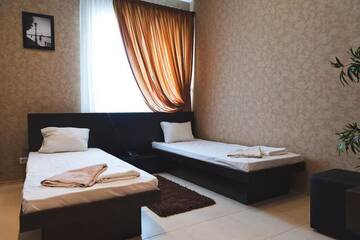 Фото номера Двухместный номер с 2 отдельными кроватями Отель Hotel 8th Mile г. Днепр 3