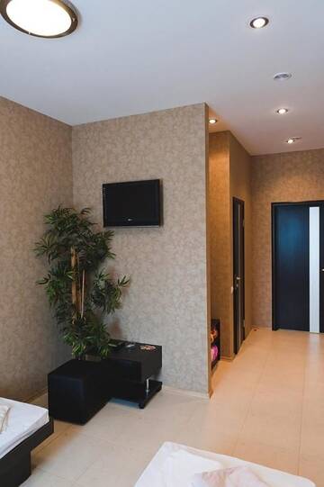 Фото номера Двухместный номер с 2 отдельными кроватями Отель Hotel 8th Mile г. Днепр 6