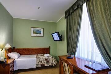 Фото номера Стандартный одноместный номер Отель Hotel Academy г. Днепр 12