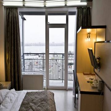 Фото номера Стандартный двухместный номер с 1 кроватью и балконом Отель Staybridge Mini-Hotel in Most City PANORAMIC RIVER VIEW г. Днепр 34