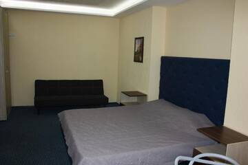 Фото номера Стандартный семейный номер Хостелы Solnechny hotel г. Днепр 3