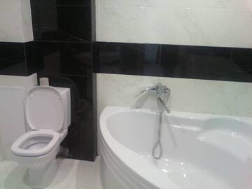 Фото номера Апартаменты с 2 спальнями Апартаменты 2-bedroom apartment lux in Most City area г. Днепр 43