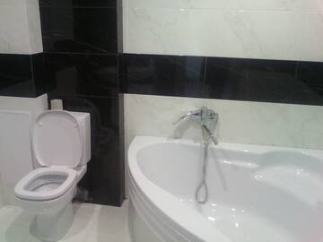 Фото номера Апартаменты с 2 спальнями Апартаменты 2-bedroom apartment lux in Most City area г. Днепр 39