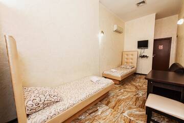 Фото номера Двухместный номер с 2 отдельными кроватями Отель Mini Hotel Smak г. Днепр 6