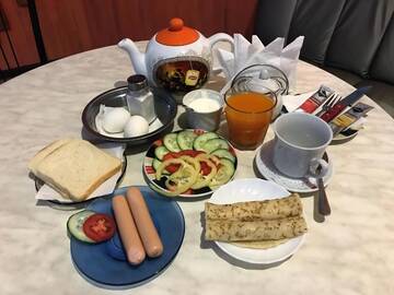 Фото номера Номер с кроватью размера &quot;king-size&quot; и гидромассажной ванной Отель Mamba Hotel г. Днепр 12