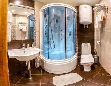 Фото номера Двухместный номер с 2 отдельными кроватями Отель Hutor Hotel г. Днепр 5