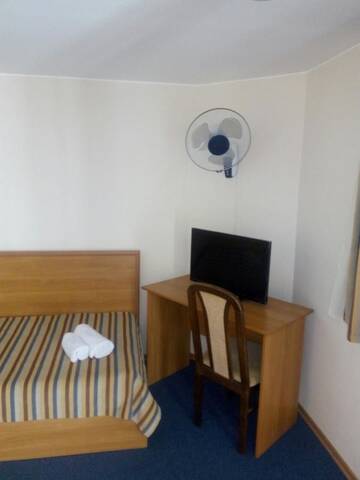 Фото номера Небольшой двухместный номер с 2 отдельными кроватями Отель Hutor Hotel г. Днепр 11