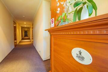 Фото номера Семейный люкс с балконом Отель Hutor Hotel г. Днепр 9