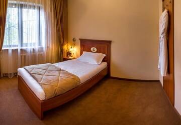 Фото номера Семейный люкс с балконом Отель Hutor Hotel г. Днепр 12
