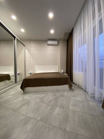 Фото номера Семейный люкс с балконом Апартаменты Soul City Apart Hotel г. Днепр 8