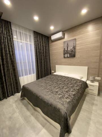 Фото номера Улучшенный четырехместный номер Апартаменты Soul City Apart Hotel г. Днепр 5