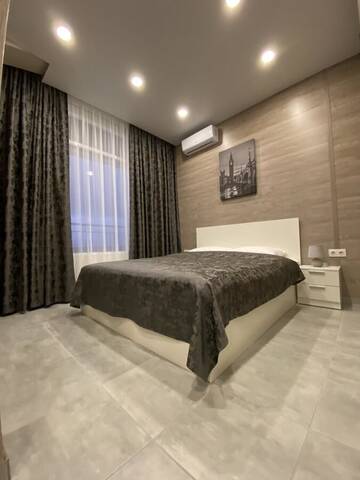 Фото номера Улучшенный четырехместный номер Апартаменты Soul City Apart Hotel г. Днепр 6