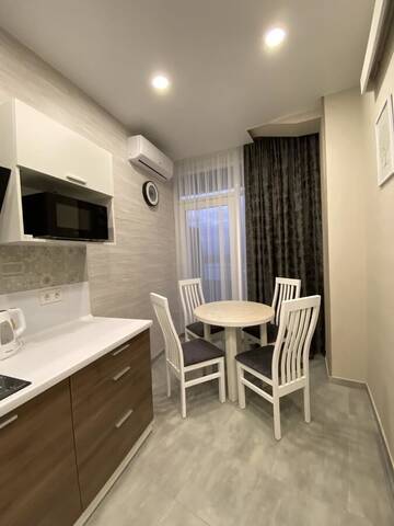 Фото номера Улучшенный четырехместный номер Апартаменты Soul City Apart Hotel г. Днепр 7