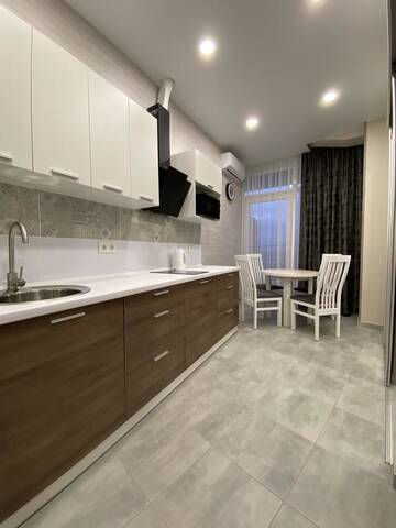 Фото номера Улучшенный четырехместный номер Апартаменты Soul City Apart Hotel г. Днепр 8