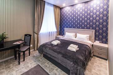Фото номера Люкс с кроватью размера «king-size» Мини-отель L.O.Y Family Hotel г. Днепр 6
