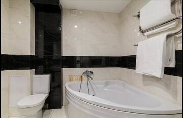 Фото номера Апартаменты с 2 спальнями Апартаменты Luxury 2-bedroom Most City Area, center г. Днепр 25